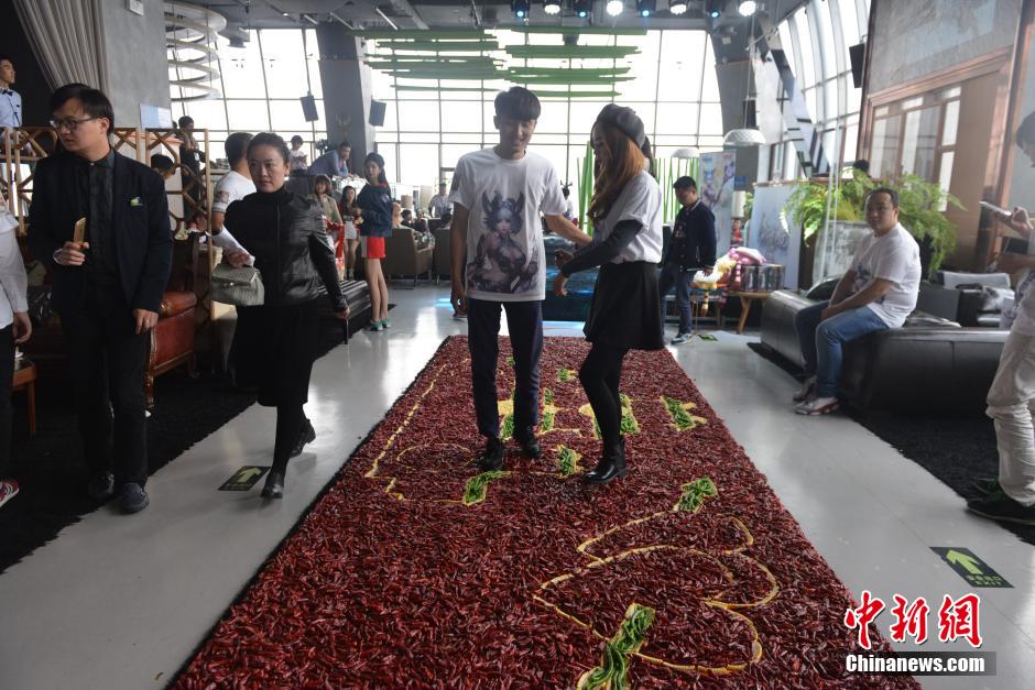 Young man proposes with 99,999 chili peppers instead of diamonds