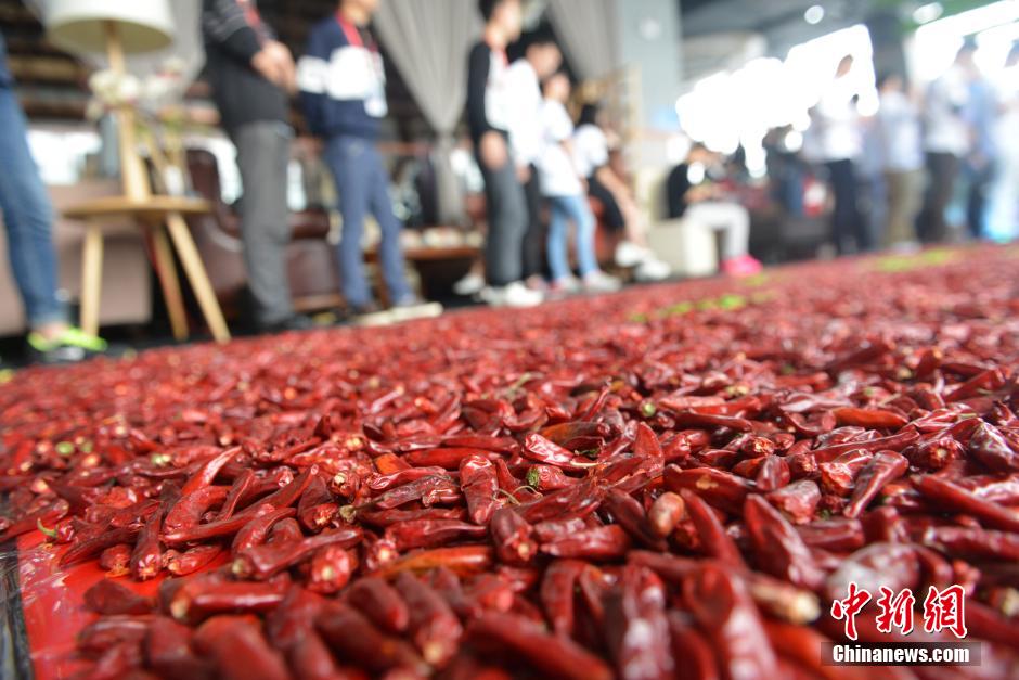 Young man proposes with 99,999 chili peppers instead of diamonds