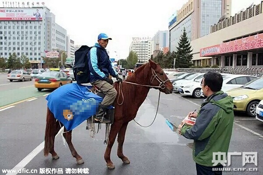 Couriers deliver packages riding horses in N China