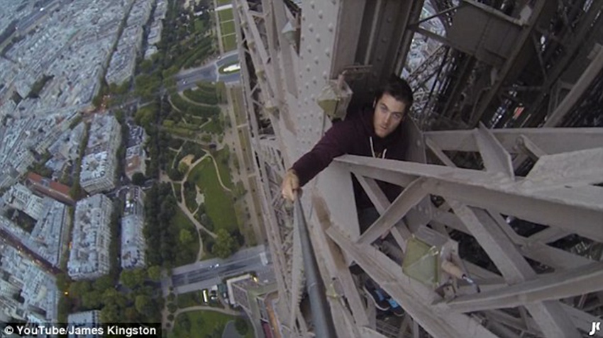 GoPro footage shows British daredevil walking across the top of the Eiffel Tower