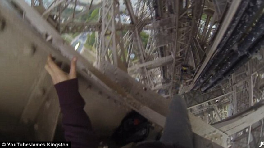 GoPro footage shows British daredevil walking across the top of the Eiffel Tower