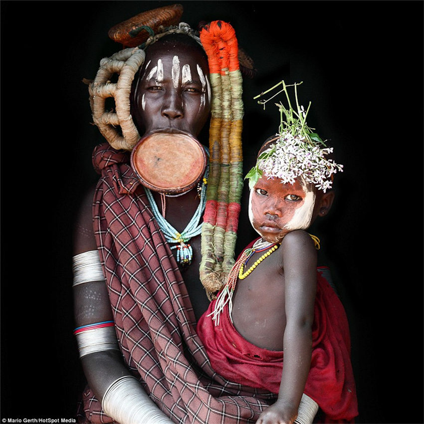 Photographer spends seven years taking intimate portraits of African tribes 