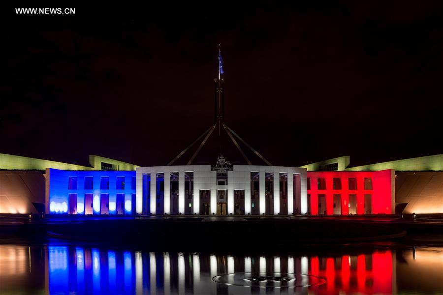 Paris attacks: Australia's Parliament House lit in French colours