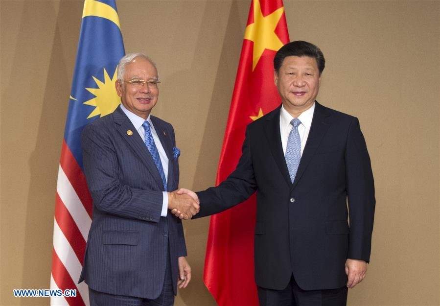 Chinese president meets Malaysian PM in Manila, the Philippines