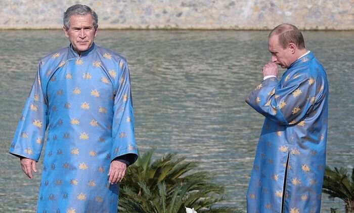 Former US president George W Bush and Russian leader Vladimir Putin look less than comfortable in the Vietnamese ‘ao dai’ silk tunic at the Apec meeting in Hanoi in 2006.