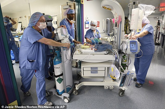 Conjoined twin girls who shared part of their livers and hearts are successfully separated