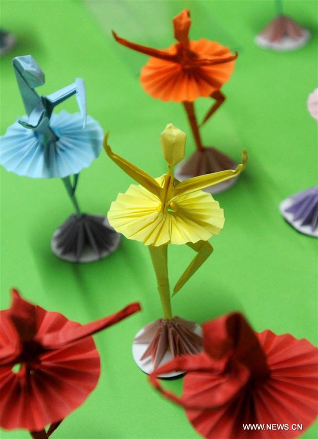 Chinese folk art: origami dancers