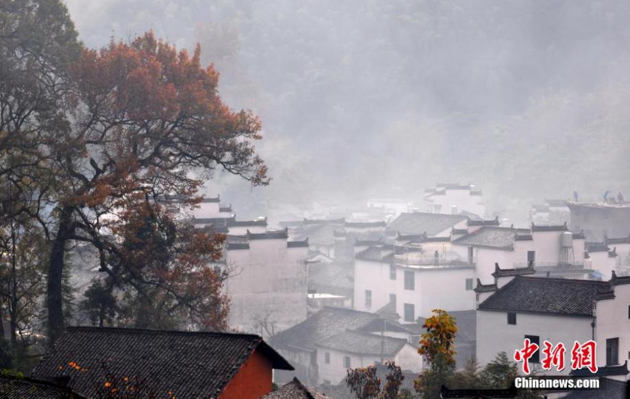 Chinese village shrouded in morning mist