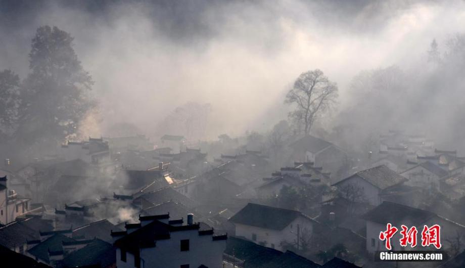 Chinese village shrouded in morning mist