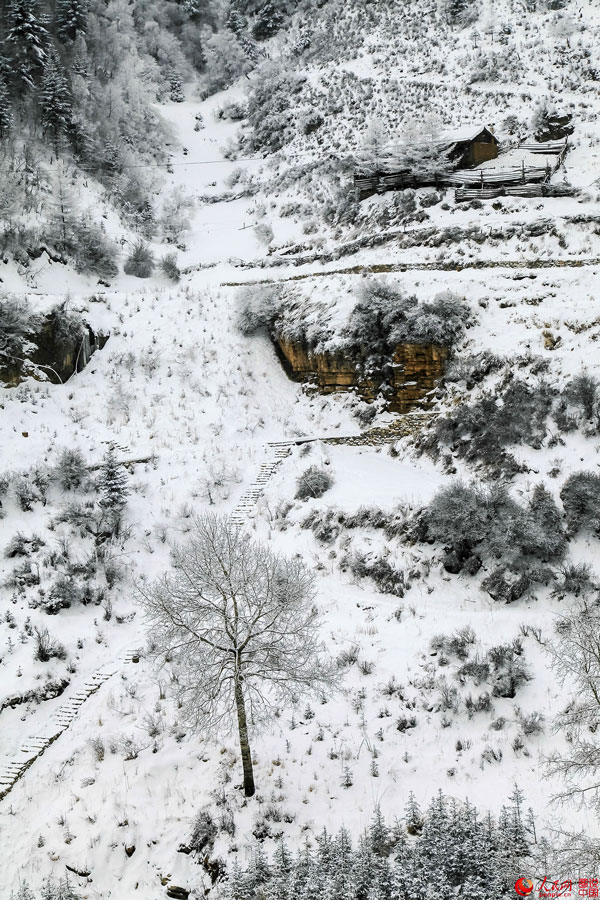 Hanging village on cliff after snow 