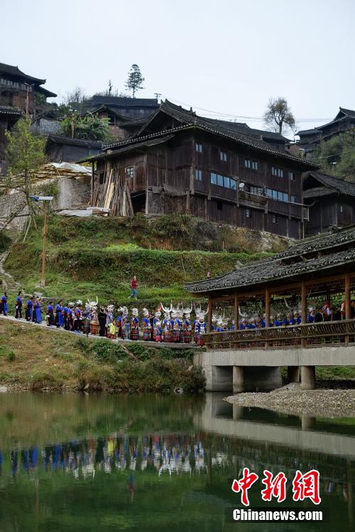 Married women of Miao ethnic group return home for New Year