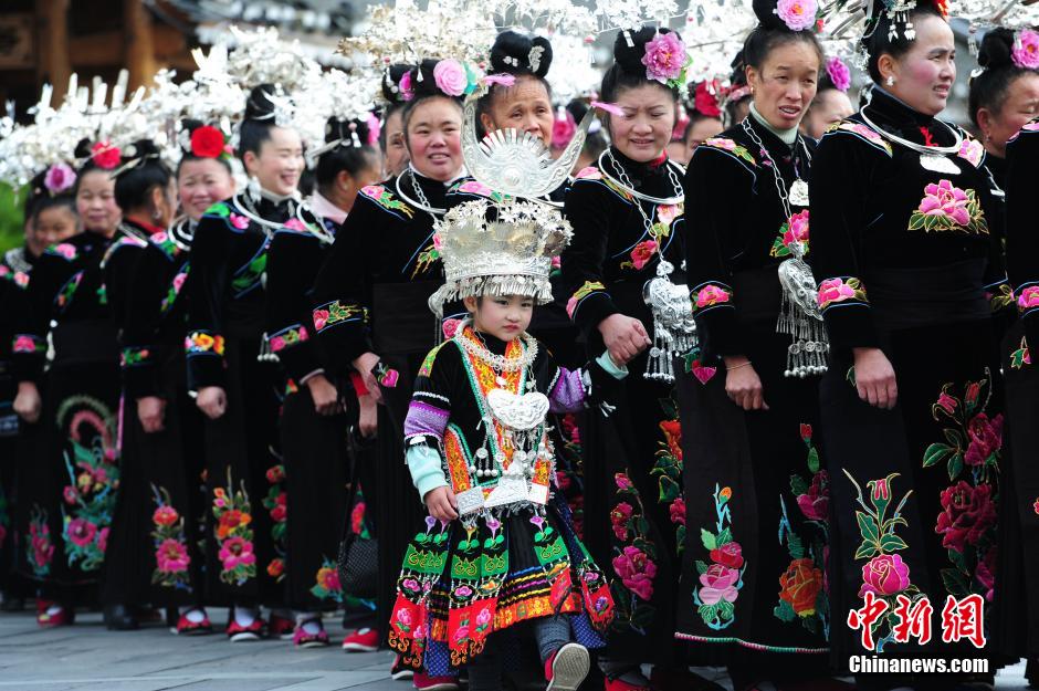 Married women of Miao ethnic group return home for New Year