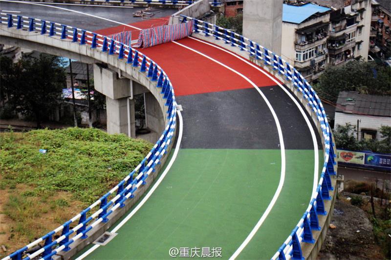 Overpass with multi-colored pavement under construction