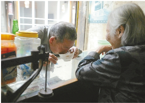 A 90-year-old shopkeeper in Xiangzhu town
