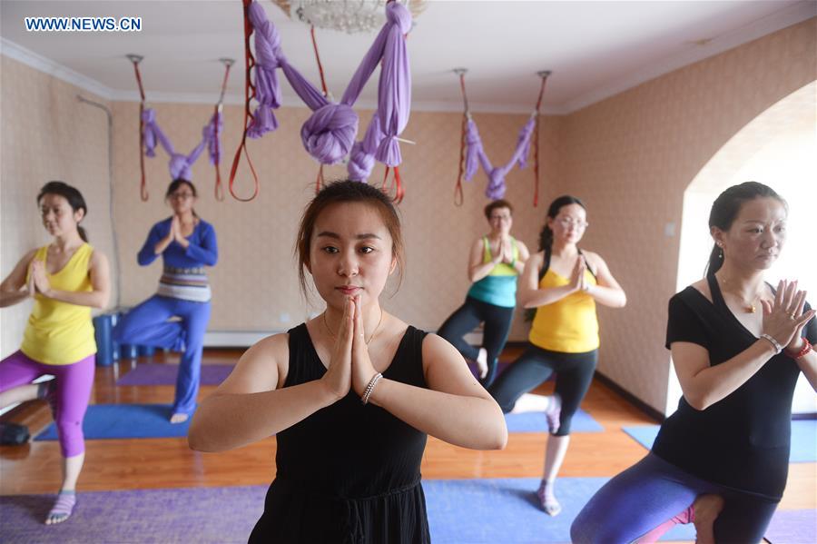 Young girls enjoy Yoga in China's Qinghai