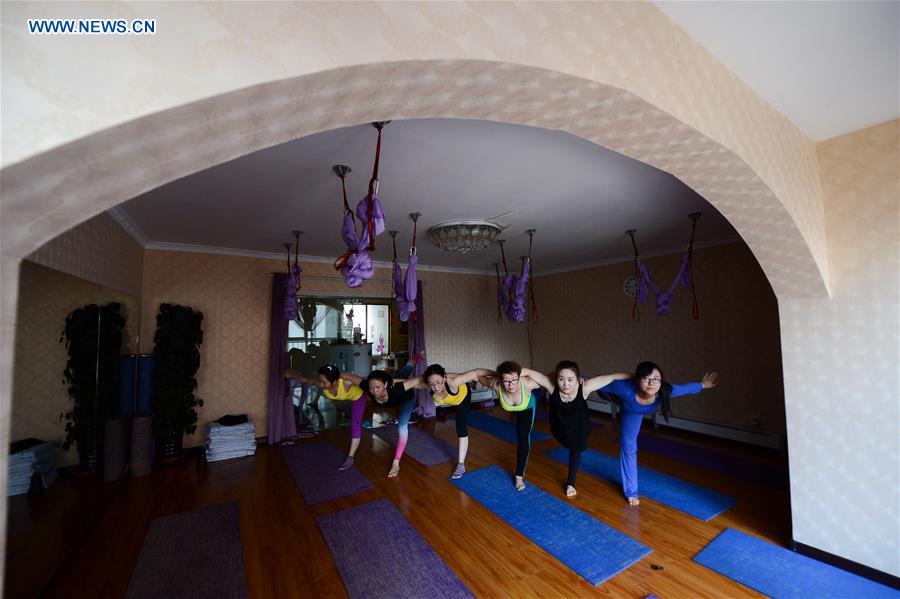 Young girls enjoy Yoga in China's Qinghai