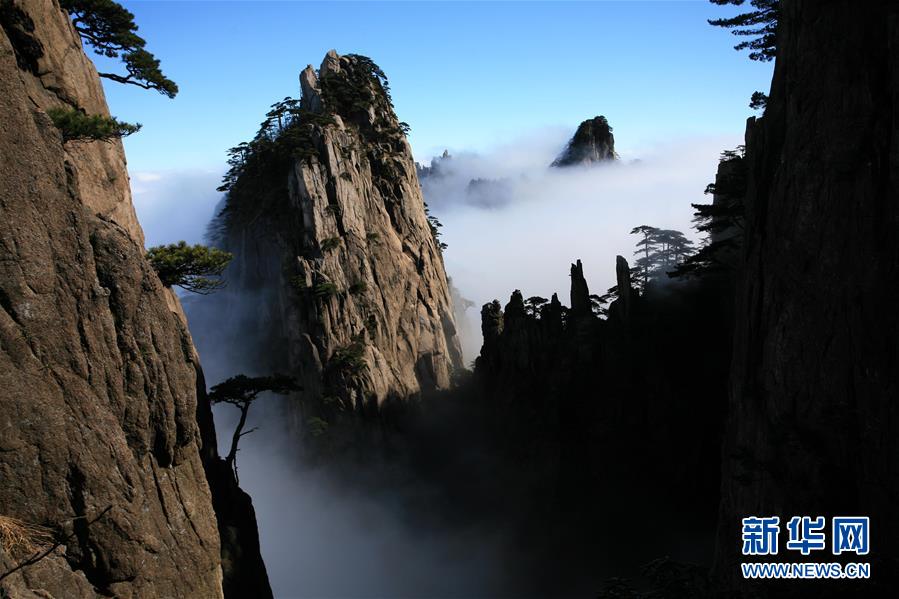 Incredible moments when cloud rolls over cliff tops like a waterfall