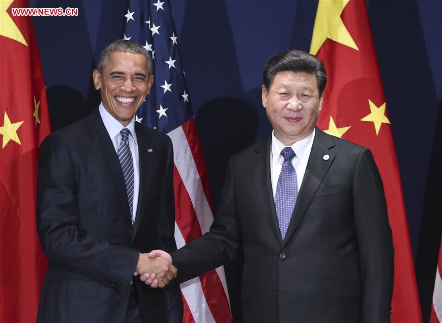 Spotlight: Xi, Obama meet in Paris, pledging cooperation on ties, climate change