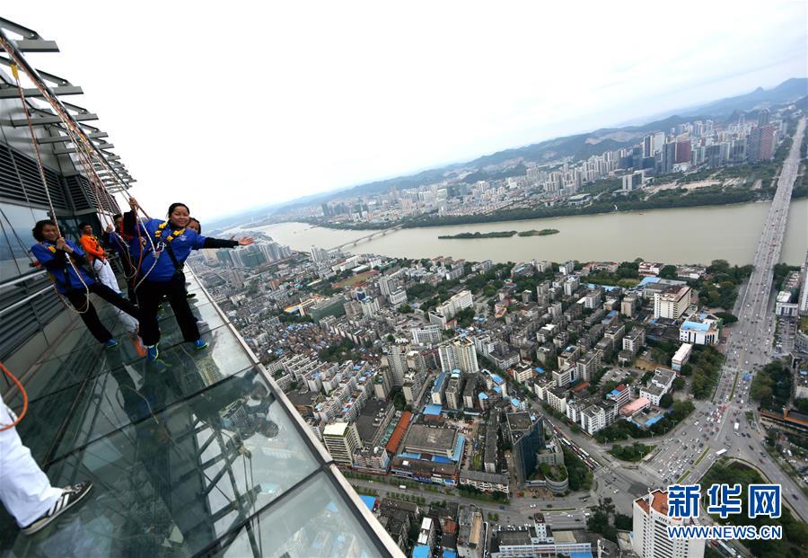 Glass skywalk built on top of skyscraper in S China