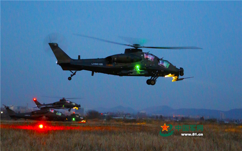 Attack helicopters conduct super low altitude flight training