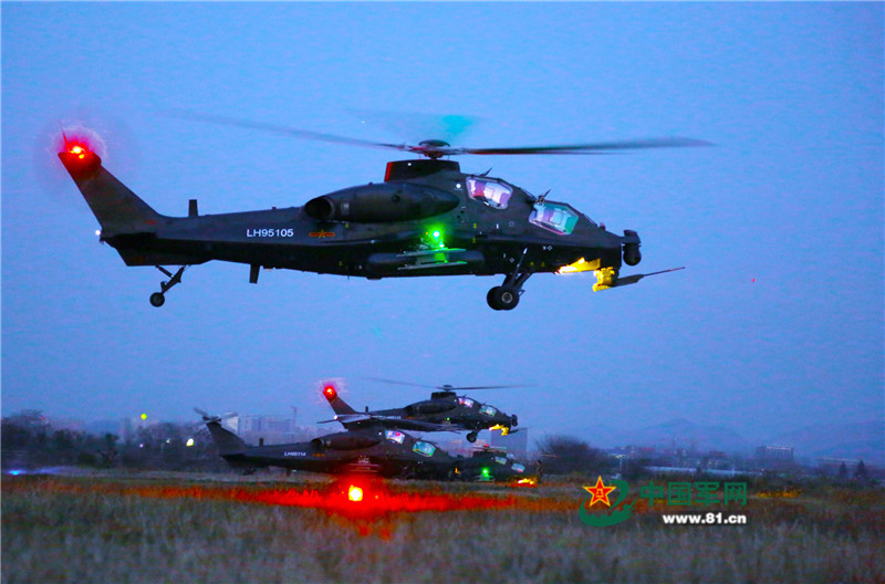 Attack helicopters conduct super low altitude flight training