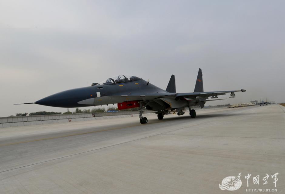 Su-30 fighter jets carrying anti-radiation missile conduct training in N China