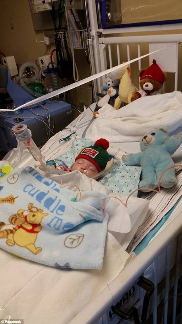 Incredible moment a little boy asks Santa to pray with him for a baby on life support