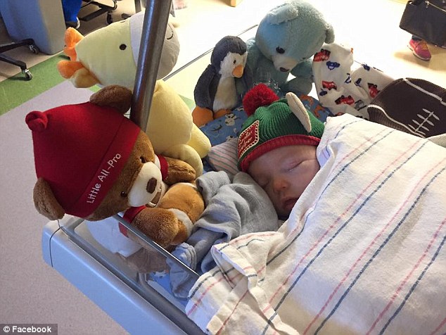 Incredible moment a little boy asks Santa to pray with him for a baby on life support