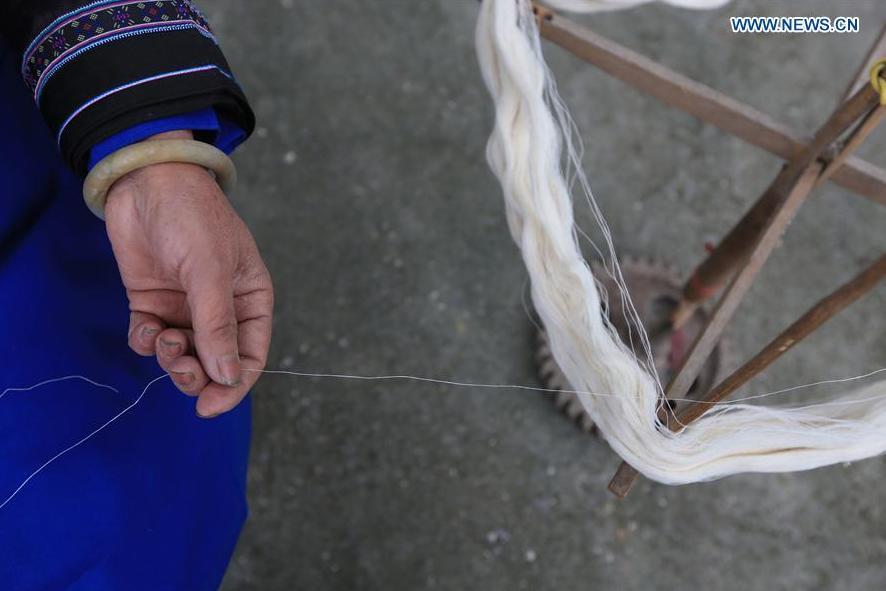 Traditional costumes making of Dong ethnic group