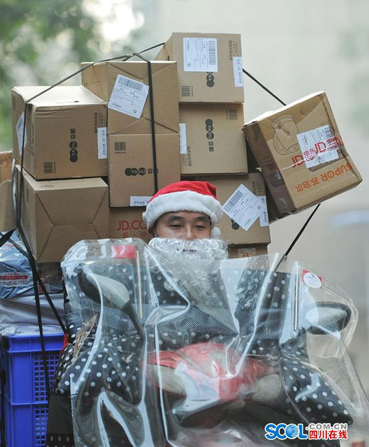 Couriers dressed as Santa Claus in Chengdu

