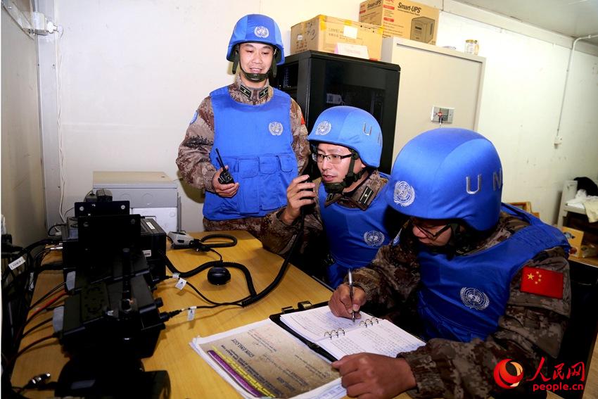 Military engineers with the Chinese peacekeeping force in Lebanon encounter air raids