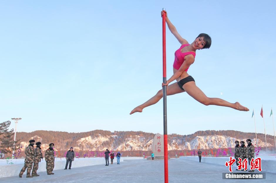 Pole dancers conduct winter training in NE China