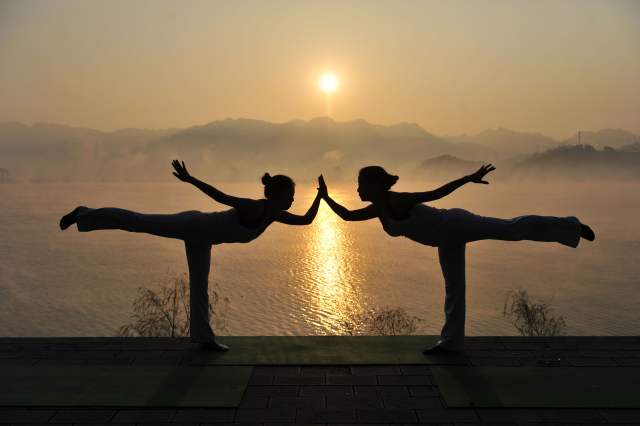 Yoga in front of the Three Gorges Dam