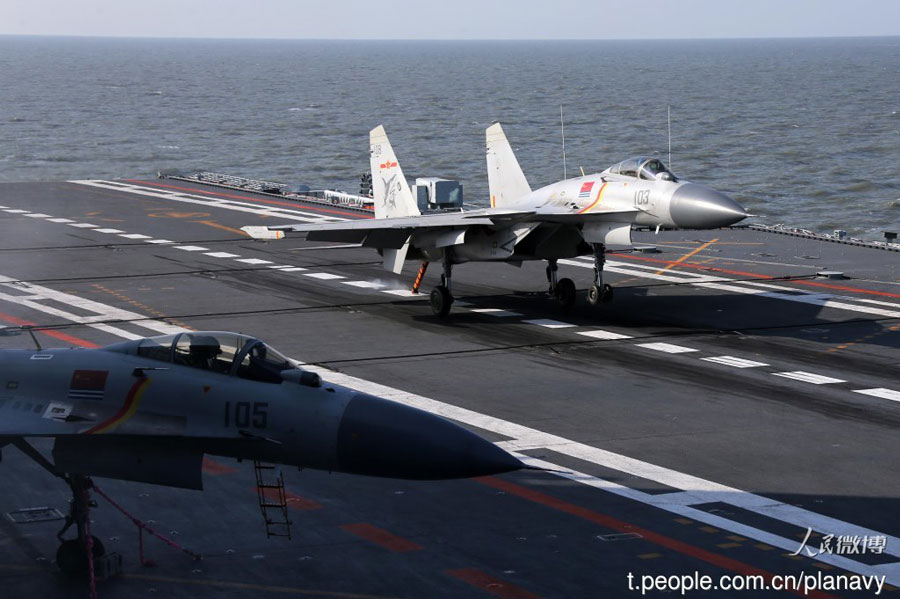 J-15 carrier-based fighters conduct training on the Liaoning