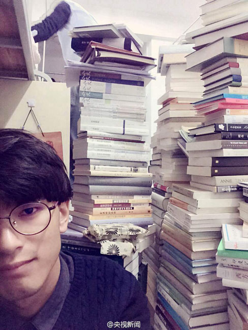 'Super scholar' has 5,000 books stacked in dormitory
