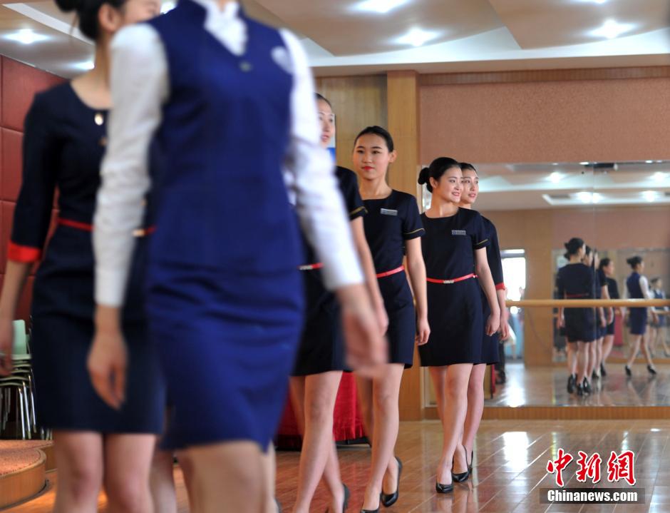 High school girls attend admission interview for college's flight attendant major