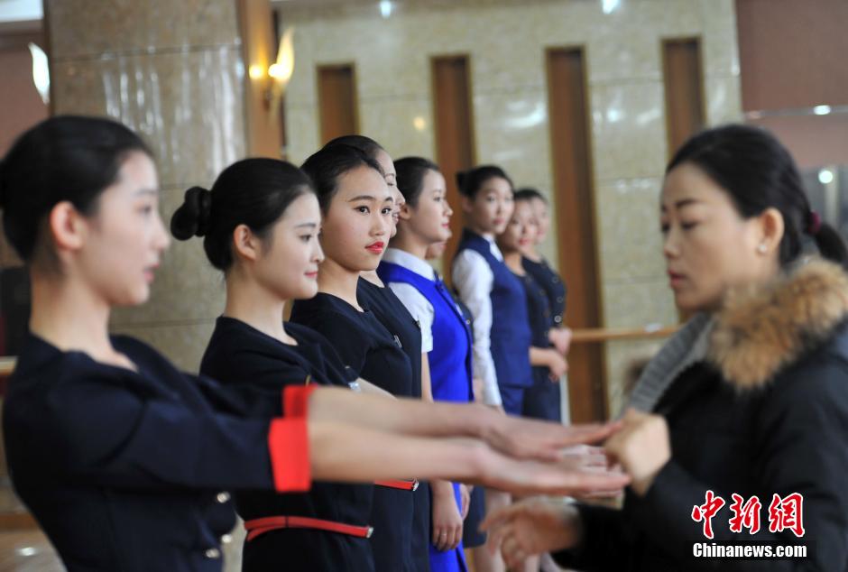 High school girls attend admission interview for college's flight attendant major