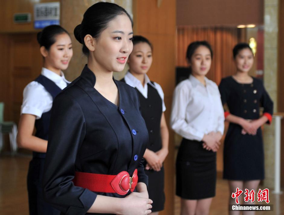 High school girls attend admission interview for college's flight attendant major
