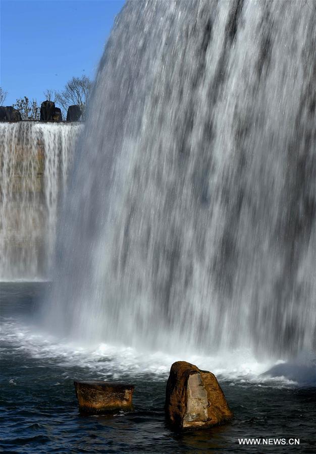 Park featuring 400m-wide manmade waterfall opens in Kunming