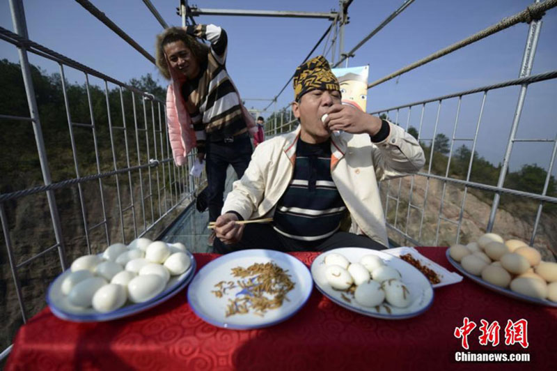 Competitive eater eats up 36 eggs with live worms in half an hour
