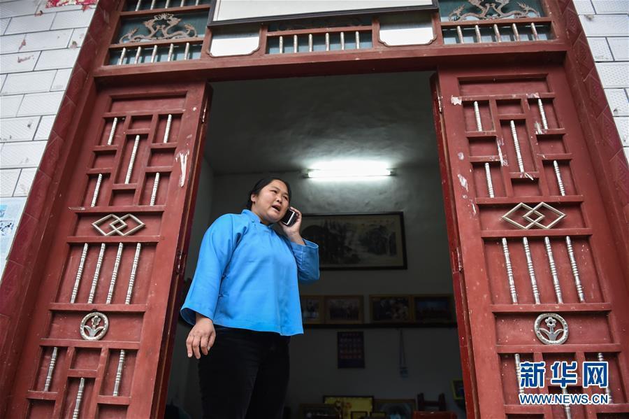 Female villager digs tunnel linking isolated village to outside world