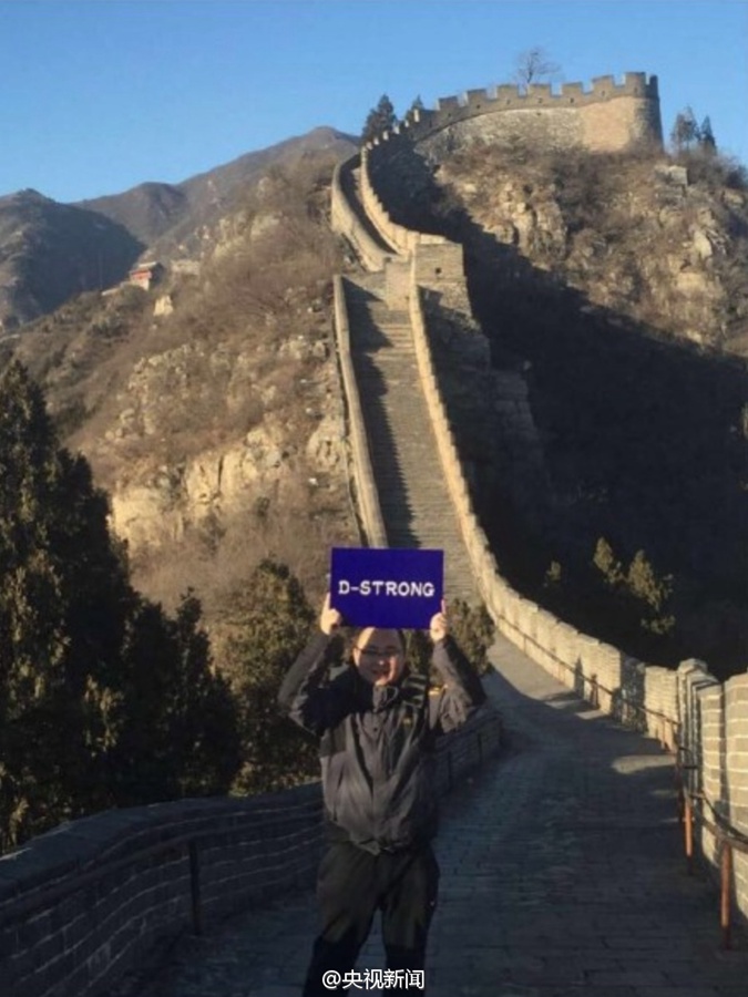 U.S. boy battling cancer realizes dream of becoming famous on China's Great Wall