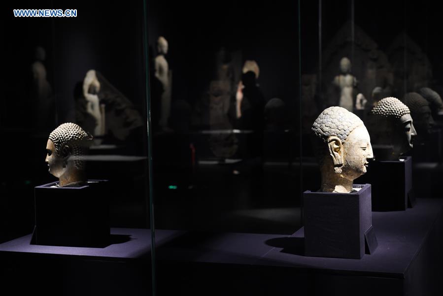 Buddhist sculptures displayed at Bao'en Temple Heritage Museum in E China 