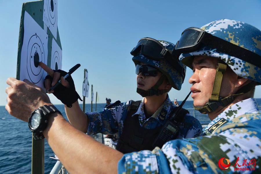 Chinese naval escort fleet conducts live fire training