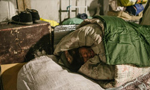 Homeless people try to survive subzero temperatures in Beijing
