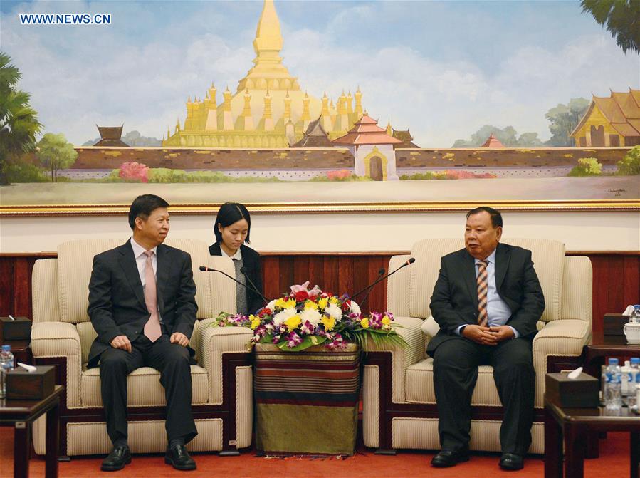 China vows to advance strategic partnership with Laos - People's Daily ...