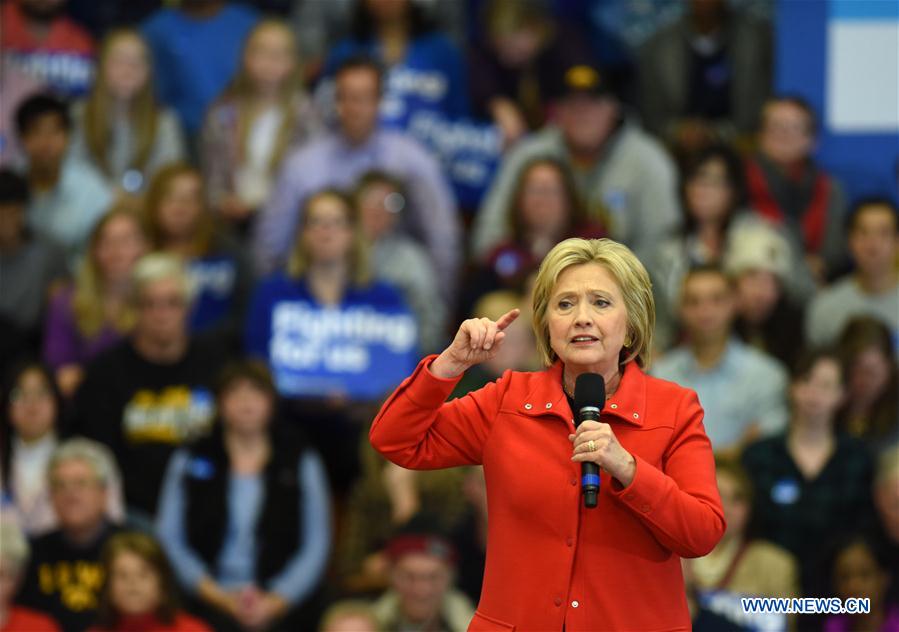 Hillary Clinton narrowly wins Democratic Iowa caucuses