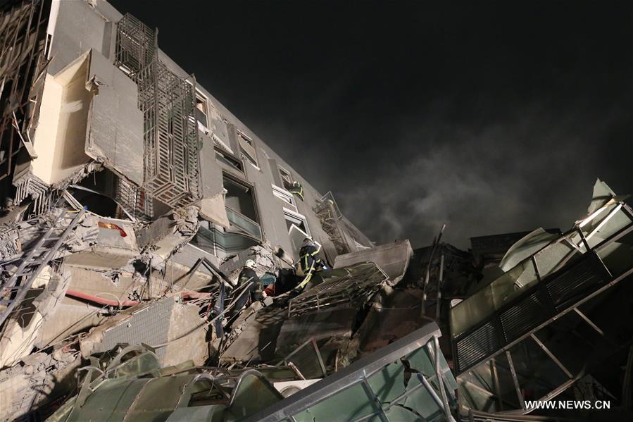 Hundreds trapped in damaged buildings as quake hits Taiwan