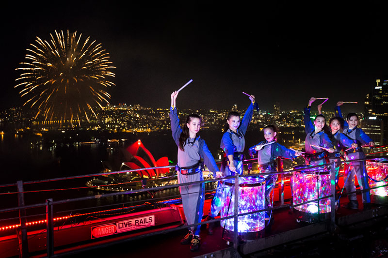Chinese Water Drummers Light Up the Sky as the Sydney Harbour Bridge Turns Red 