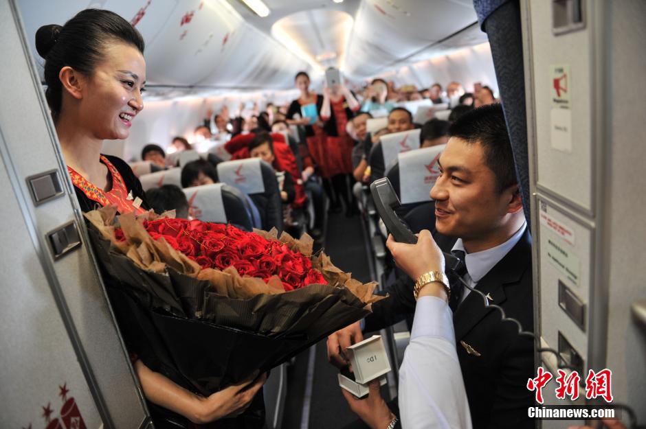 She said Yes! Flight attendant pulls off perfect airplane proposal on Valentine's Day